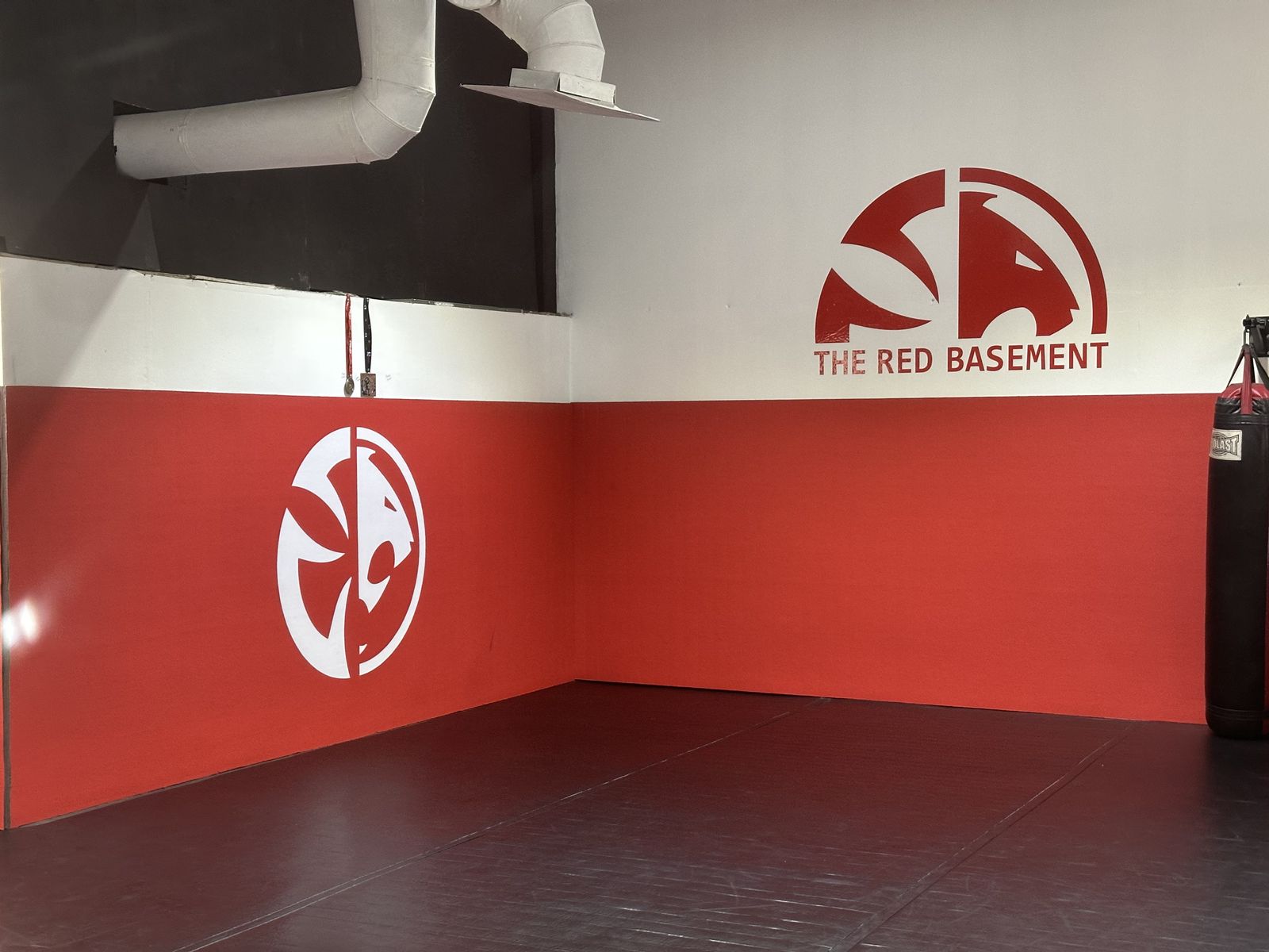 Heavy bag corner of the Red Basement training room at Renzo Gracie Evolution in Chatsworth