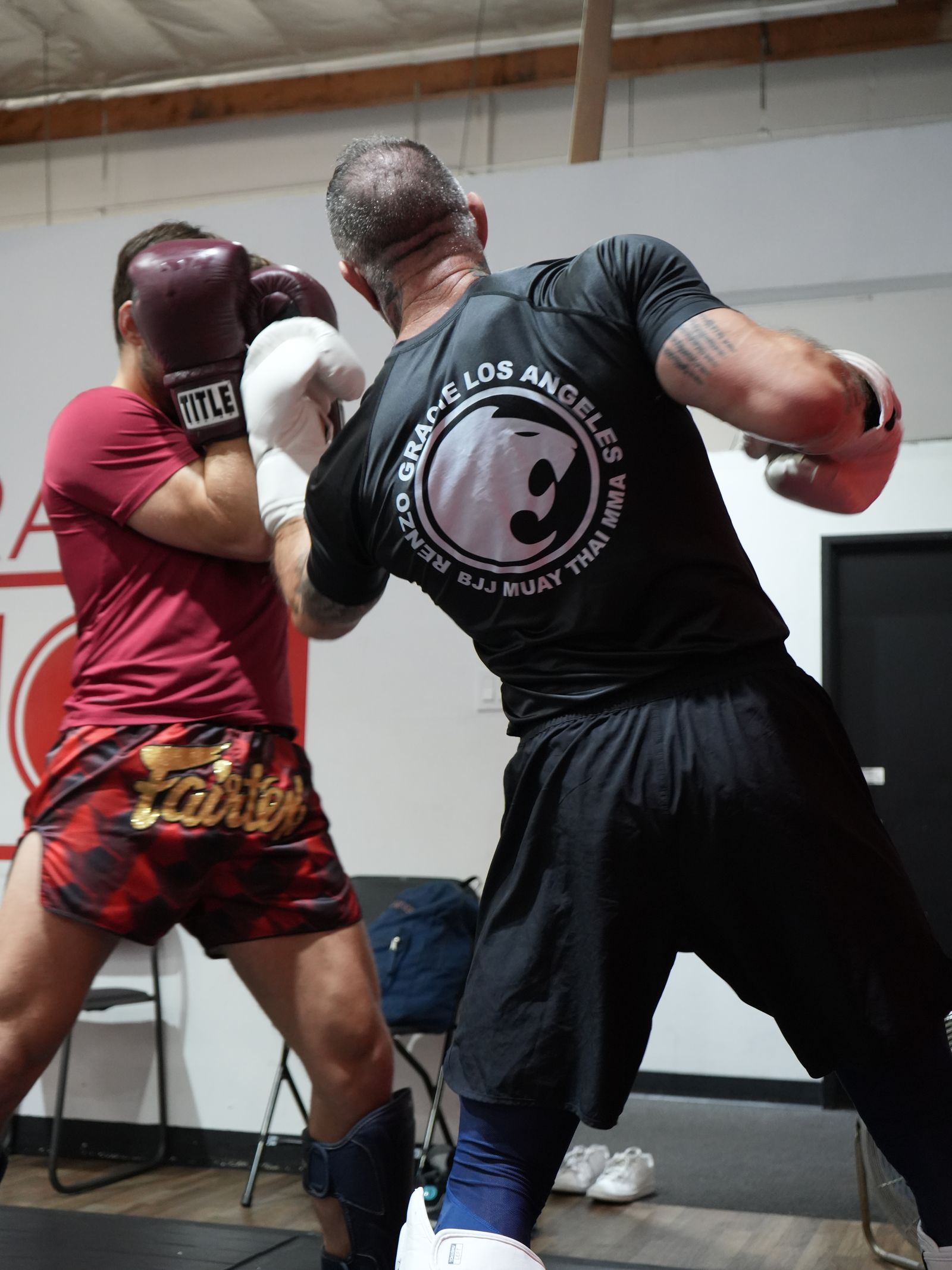 Two adult Muay Thai students sparring in gloves at Renzo Gracie Evolution in Chatsworth